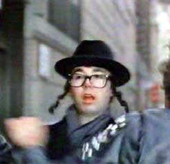 Three Bad Jewish Brothers performing on stage